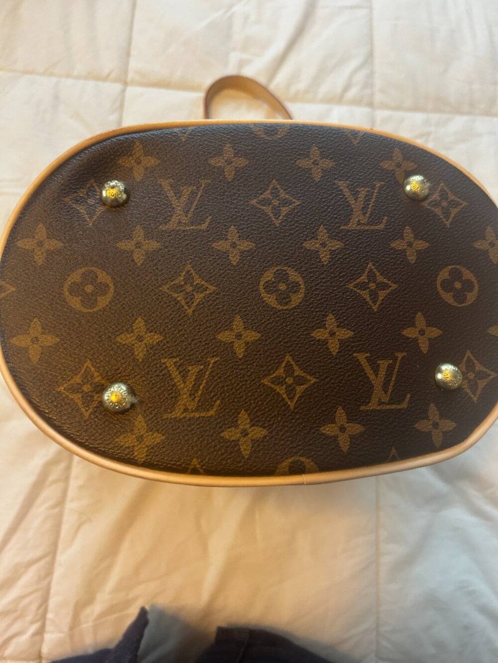 Brown Monogram bucket bag with monogram canvas. - Picture 6 of 7